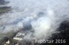 Luftaufnahme UMWELTBELASTUNG/Nebel und Rauch ueber Perlen - Foto Papierfabrik Perlen 2411